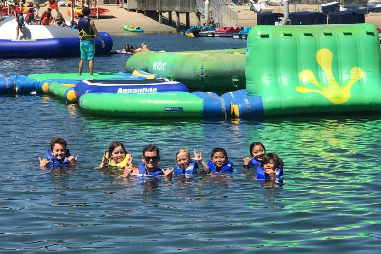 Kids paddle board summer camp in Newport Beach