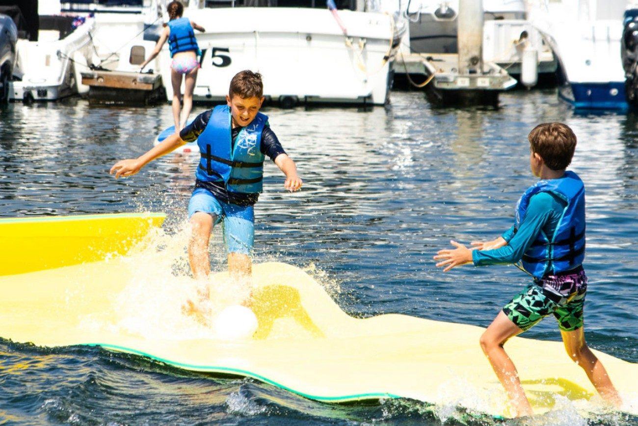 Kids paddle board summer camp in Newport Beach