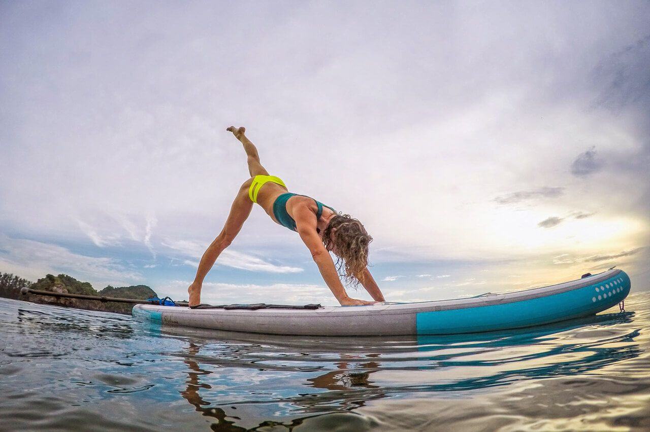 SUP yoga class on paddle boards in Newport Beach