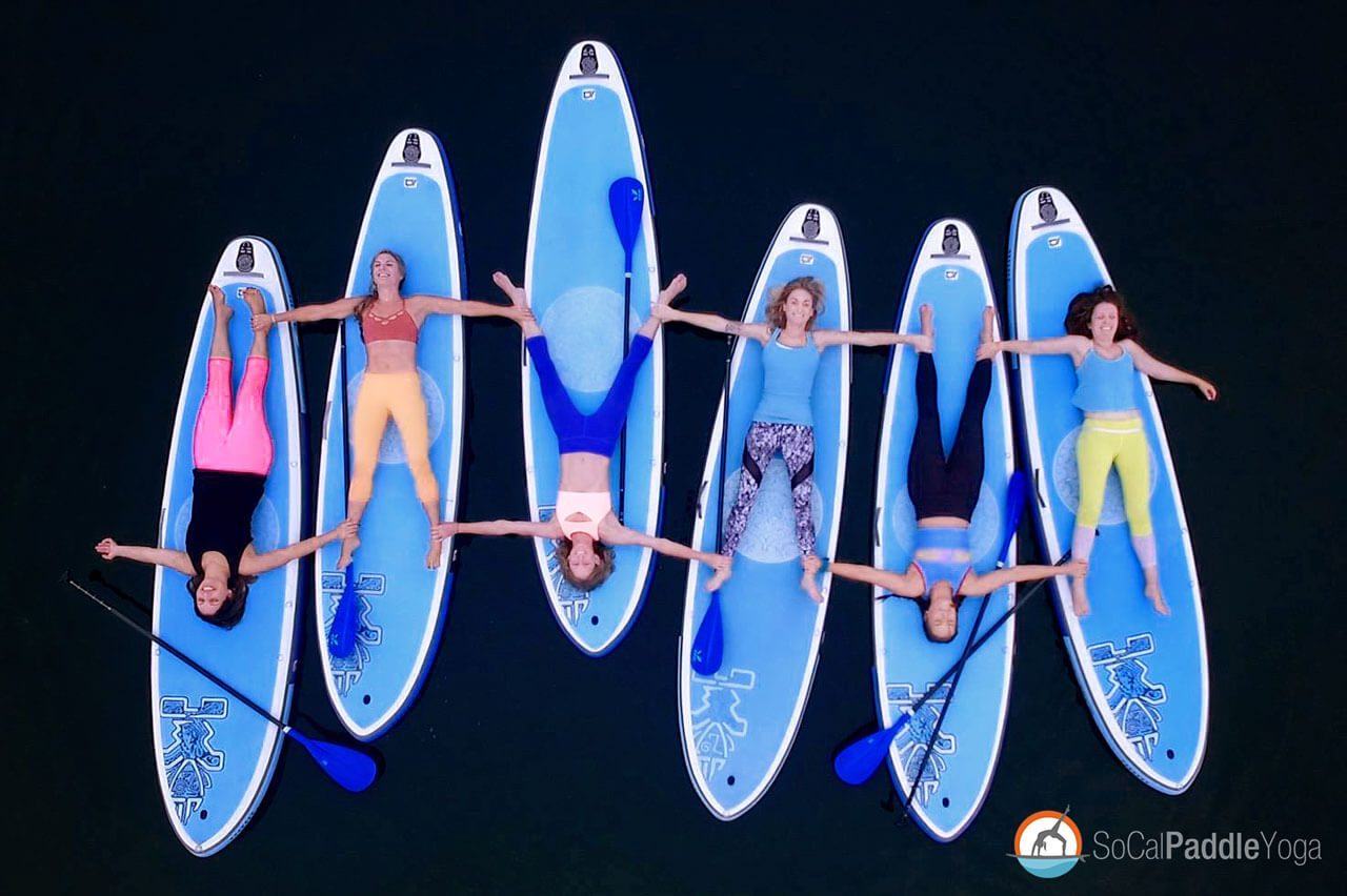 SUP yoga class on paddle boards in Newport Beach